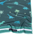 Dino Park - Strandtuch für Kinder - schadstofffrei, schnelltrocknend  & sanft zur Haut (140cm x 70cm) - WOODSANDWAVES