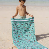 Ship Ahoy - Strandtuch für Kinder - schadstofffrei, schnelltrocknend  & sanft zur Haut (140cm x 70cm) - WOODSANDWAVES